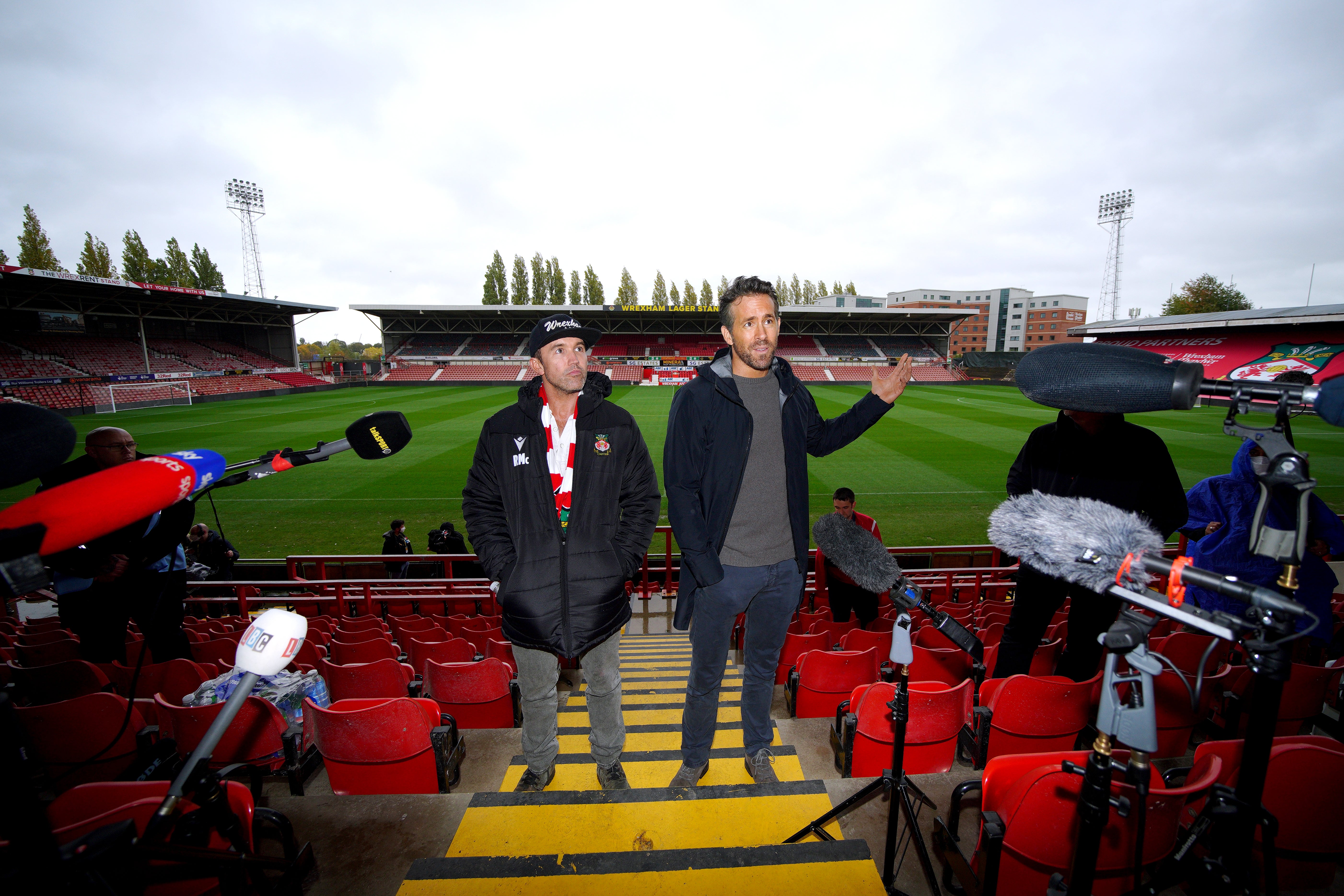 Wrexham co-chairmen Rob McElhenney and Ryan Reynolds during a press conference at the Racecourse Ground in October 2021 (Peter Byrne/PA)