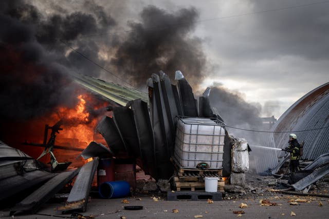 <p>Firefighters try to extinguish a fire after a chemical warehouse was hit by Russian shelling on the eastern frontline near Kalynivka village on 8 March 2022, in Kyiv, Ukraine</p>