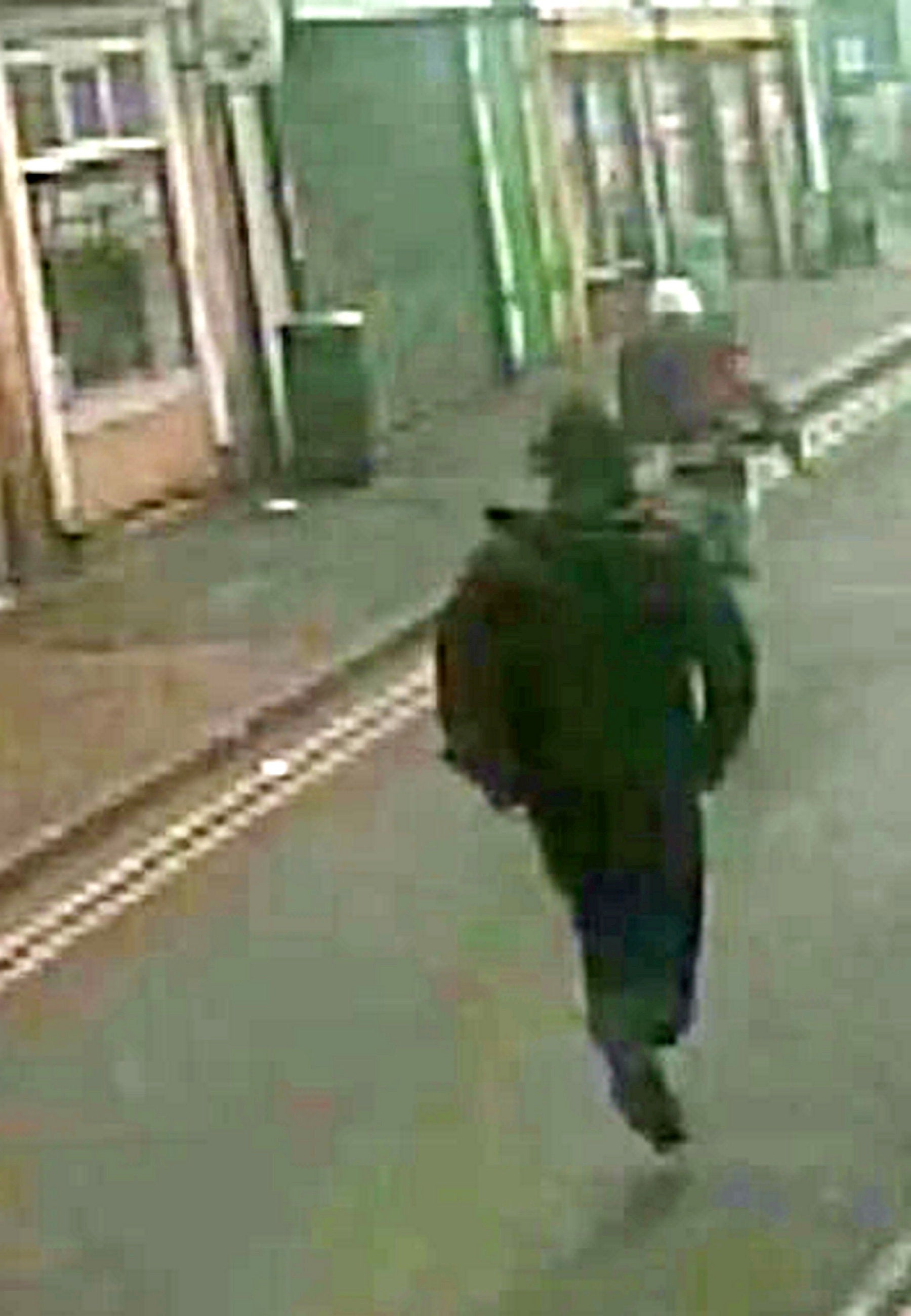 A CCTV image shows Derlano being chased into a nearby supermarket.