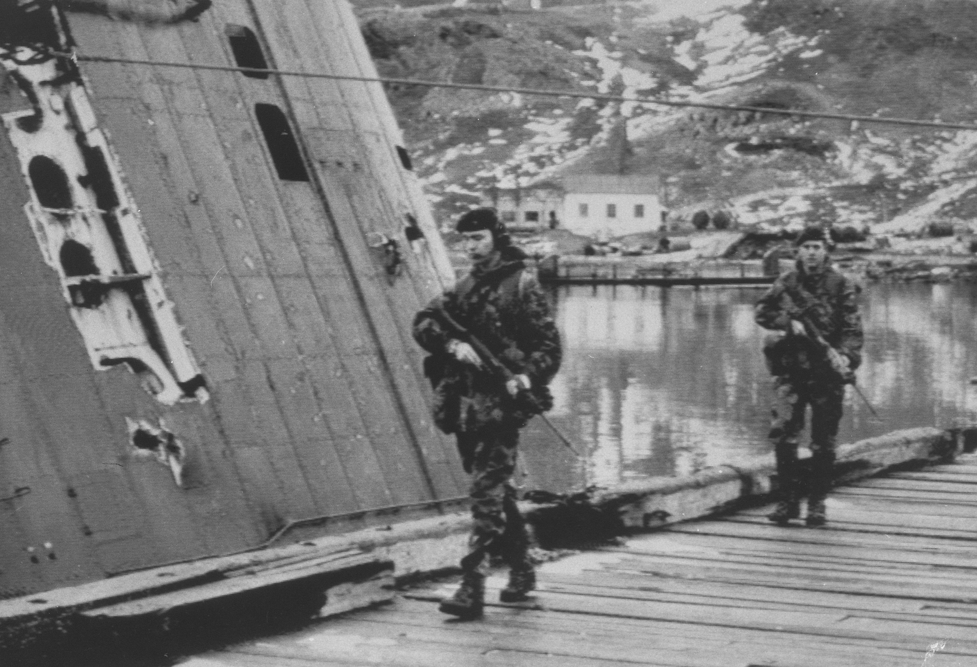 Royal marines on patrol in Grytviken Harbour in 1982