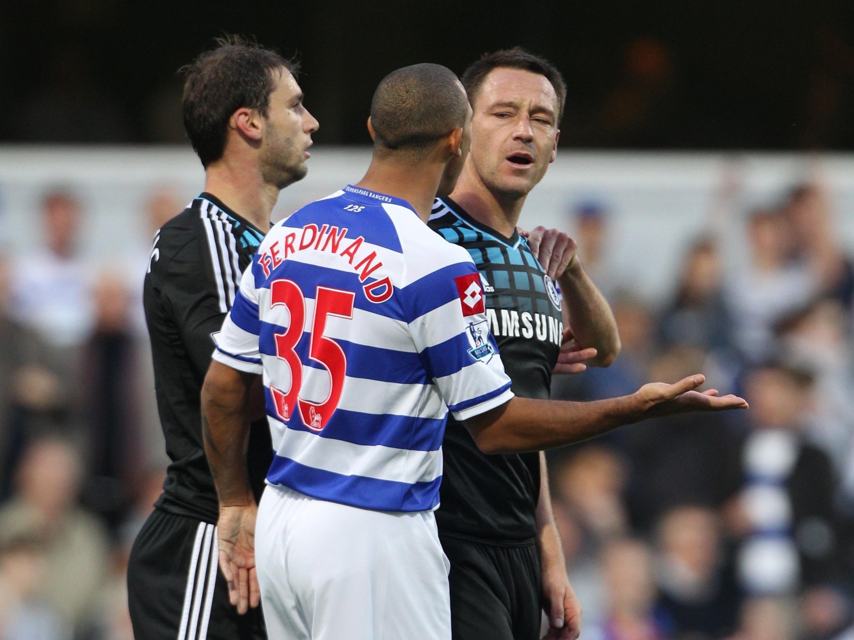 John Terry and Anton Ferdinand pictured during the Premier League match between QPR and Chelsea at Loftus Road in October 2011 (Nick Potts/PA)