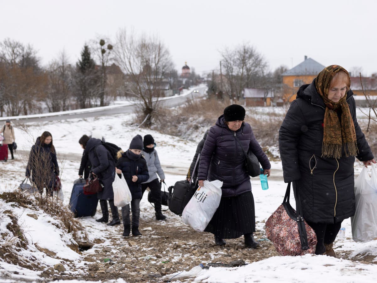 Ukraine war in photos, day 14: Refugee crisis escalates as deaths mount and Russia faces protests