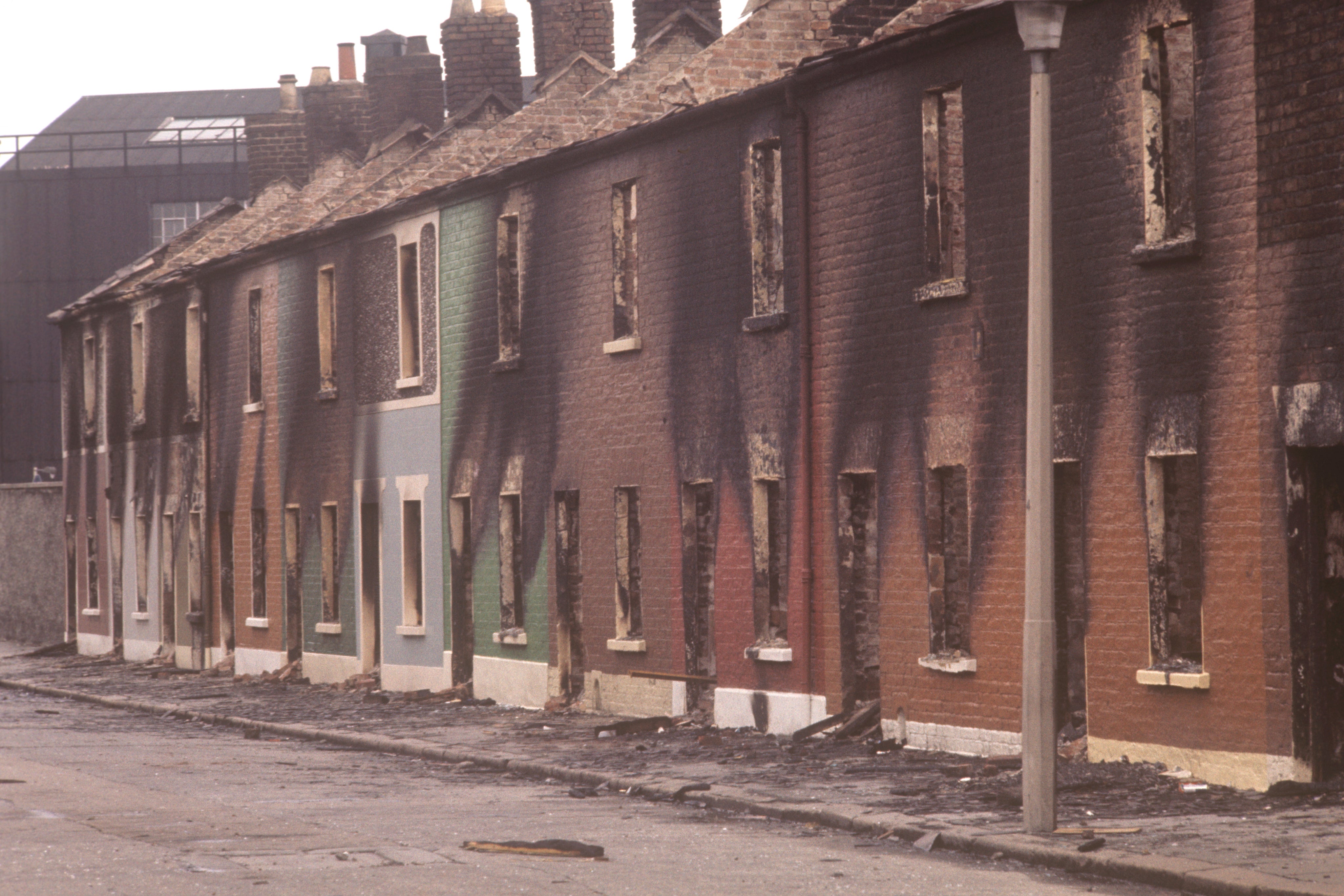 A row of burnt-out houses in Conway Street, Belfast (Archive/PA)