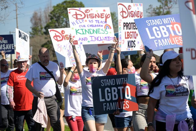<p>Demonstrators protest against Disney’s handling of the ‘Don’t Say Gay’ controversy </p>