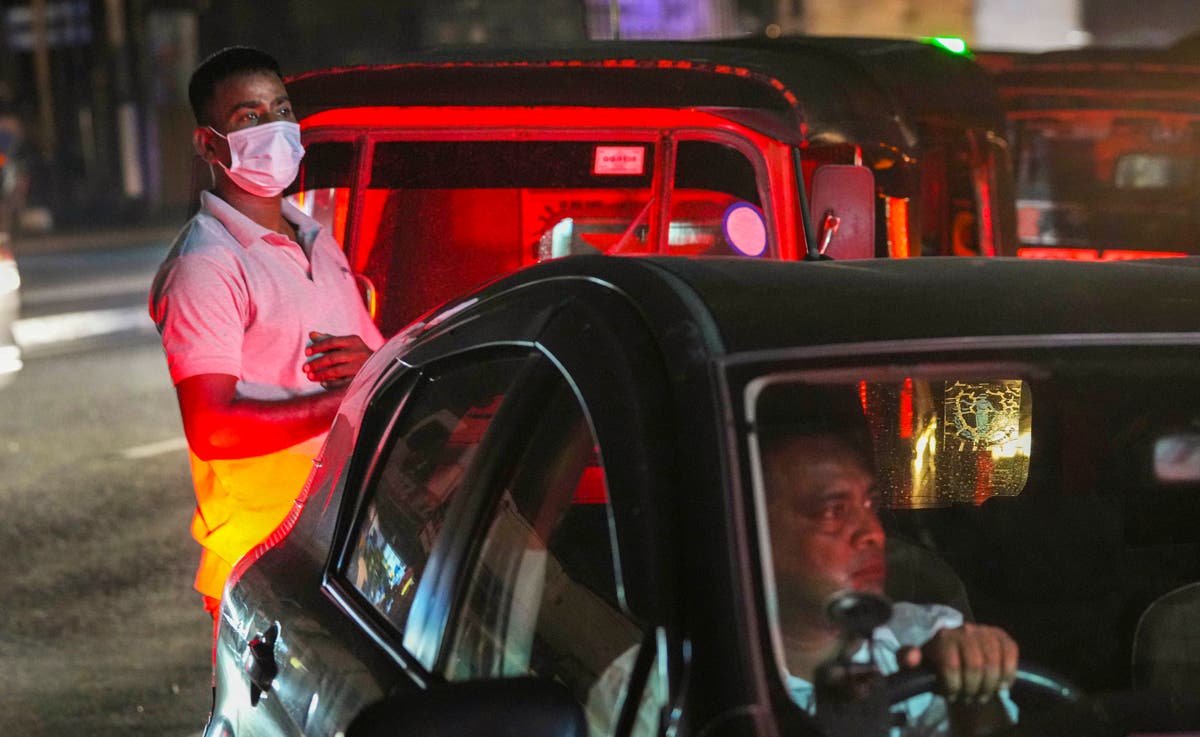 AP PHOTOS: Sri Lankan power cuts affect all walks of life
