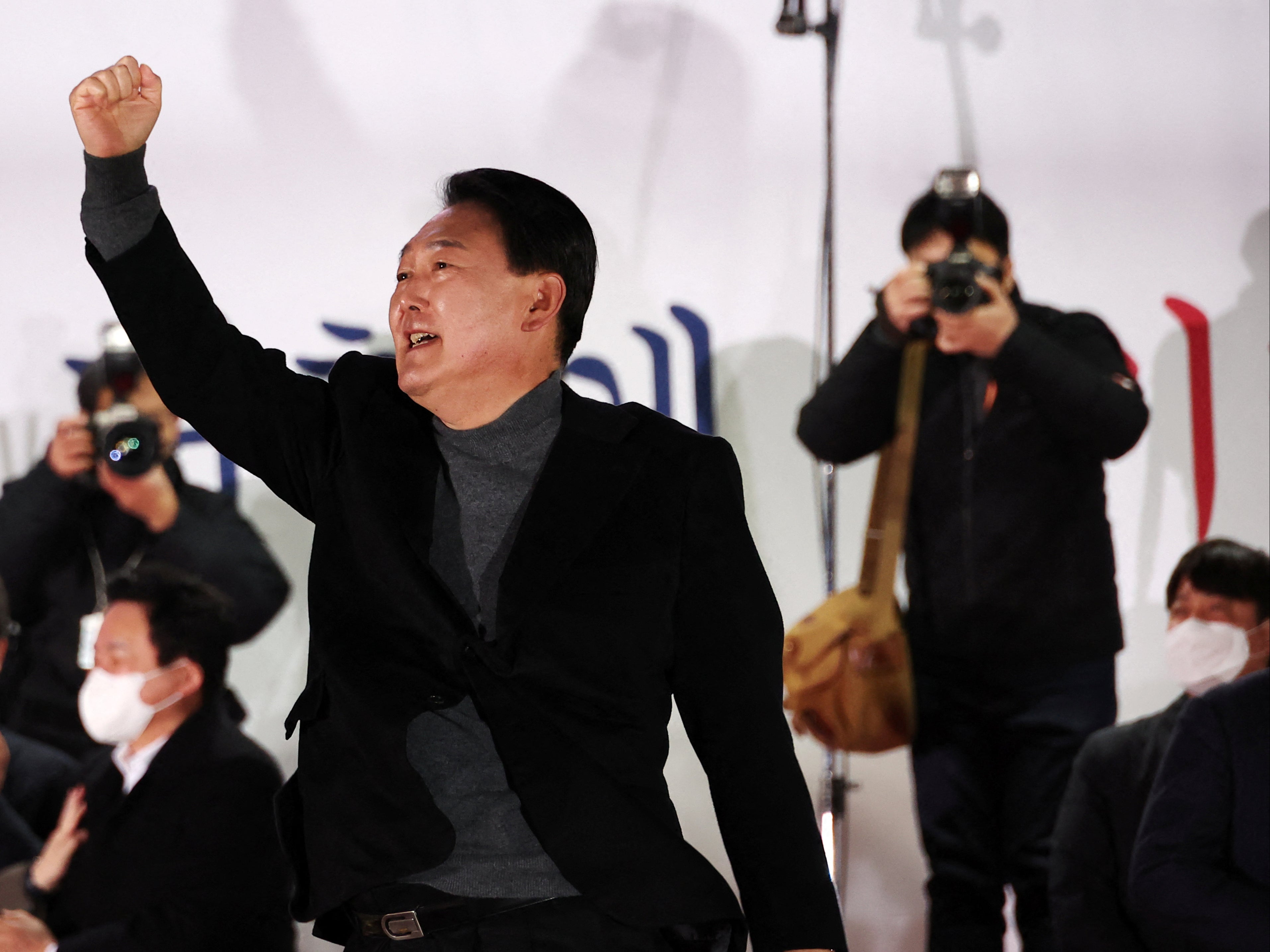 File: Yoon Suk-yeol, the new president of South Korea from the main opposition People Power Party (PPP), gestures during an election campaign rally in Seoul