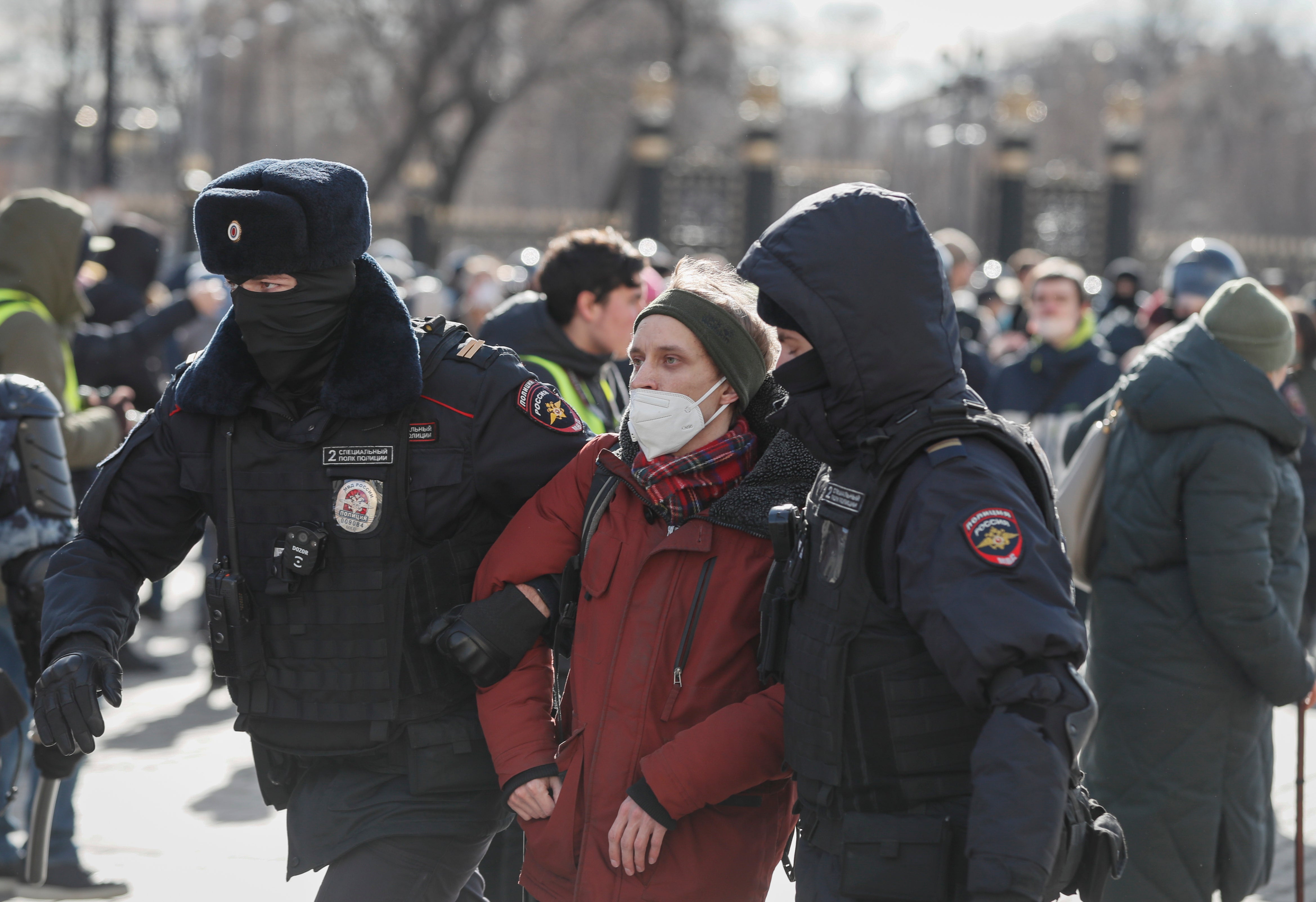 Russian policemen detain a participant in an unauthorized rally against the Russian special operation in Ukraine, in downtown Moscow, Russia.