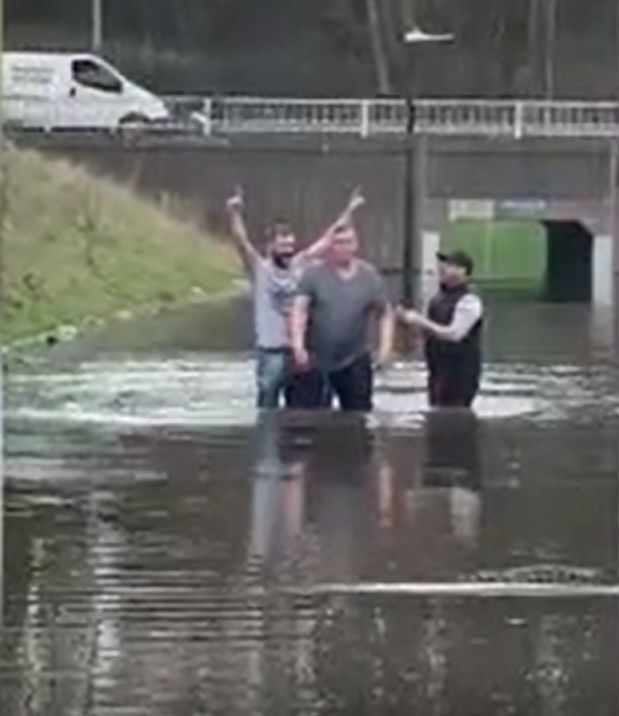 Celebration following the baptism in a flooded underpass in Bristol