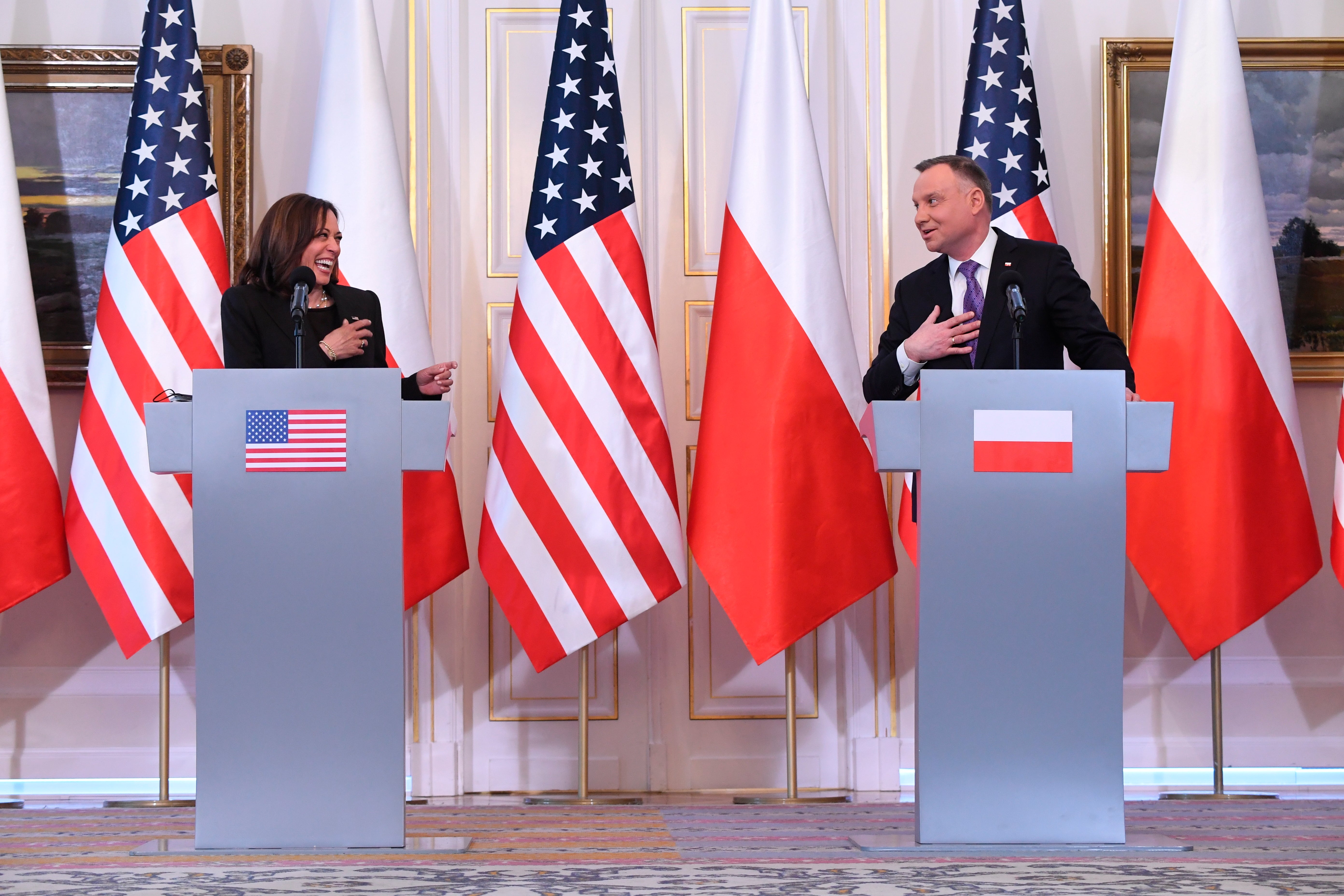 Polish President Andrzej Duda, right, and US Vice President Kamala Harris hold a press conference at Belwelder Palace, in Warsaw, Poland, Thursday, March 10, 2022. (Saul Loeb/Pool Photo via AP)