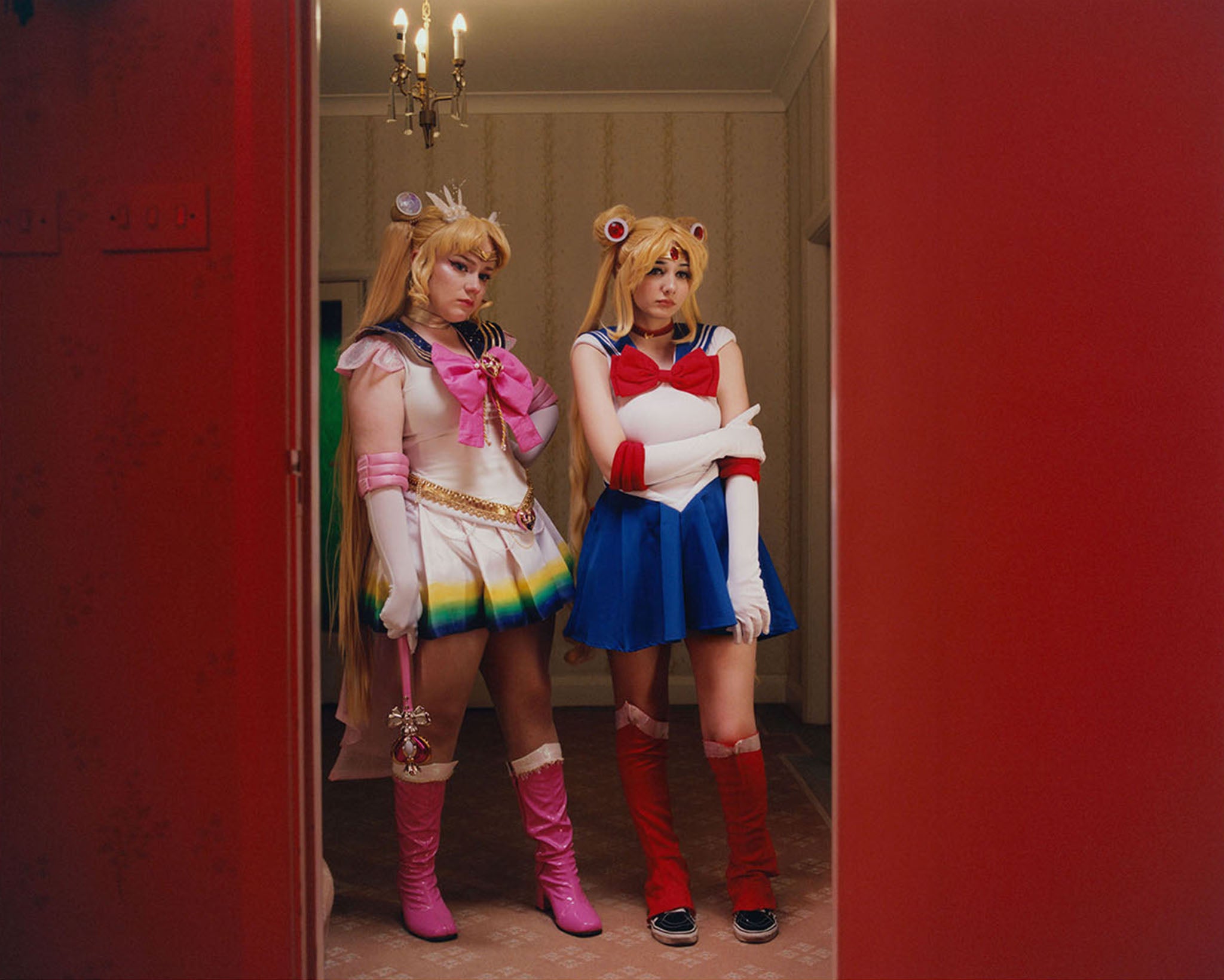 A student and a professional cosplayer as anime character Sailor Moon