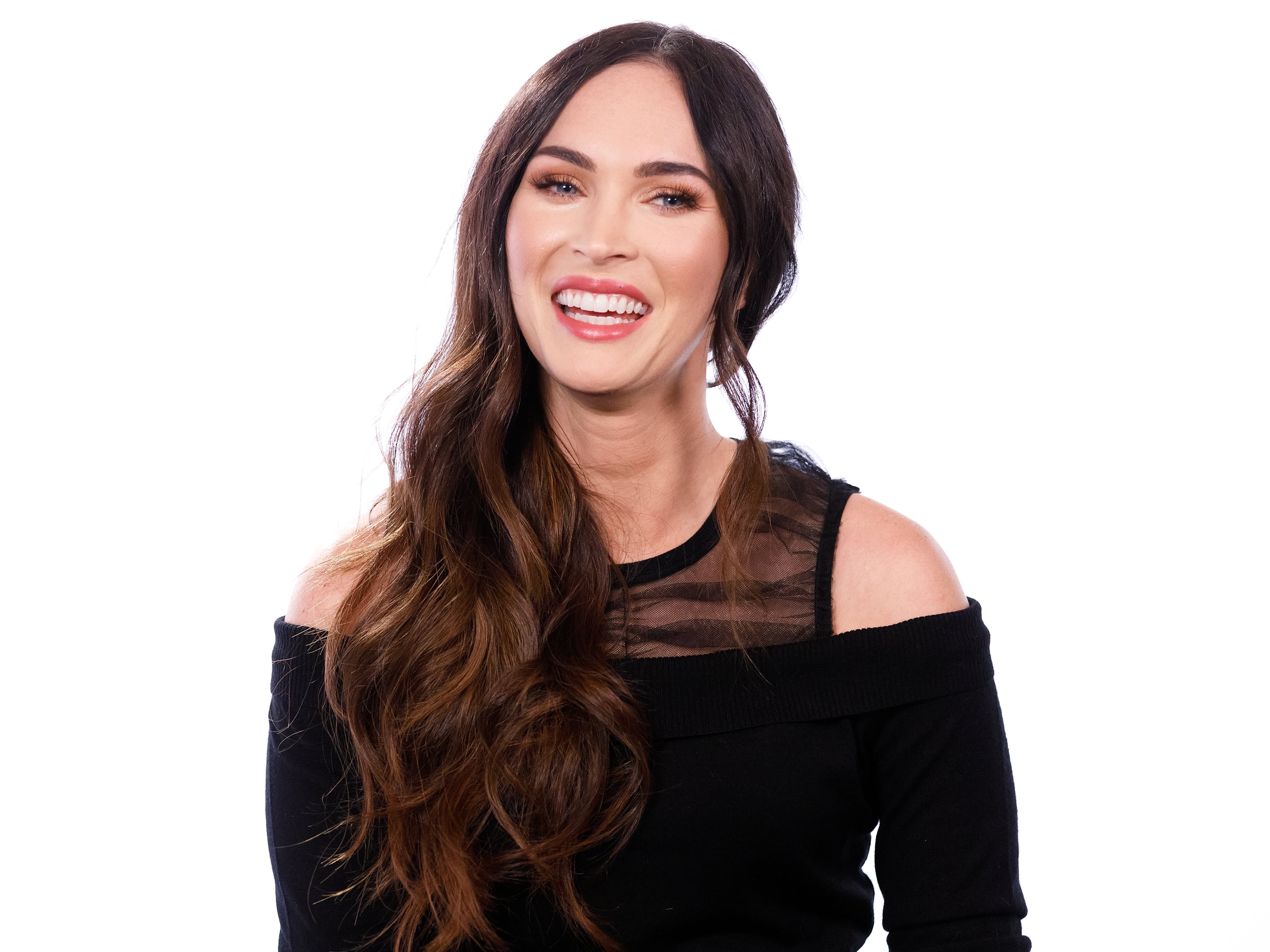 Megan Fox compares her latest outfit to a grandmother’s couch