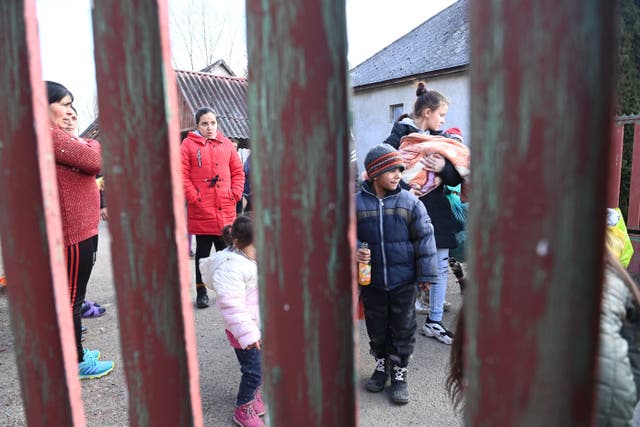 <p>Romani people fleeing Ukraine arrive in Tiszabecs, Hungary, in late February </p>