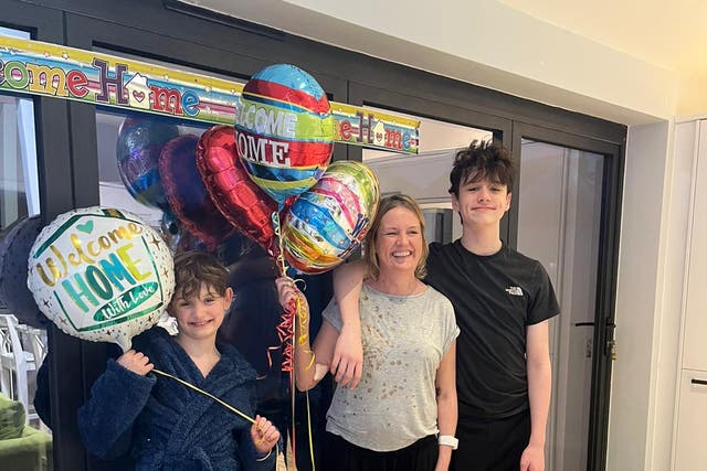 Nicola Sharpe with her sons after spending 190 days in hospital (Royal Papworth Hospital/PA)