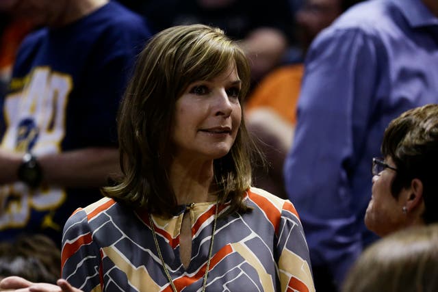 <p>The wife of head coach Jim Boeheim of the Syracuse Orange, Juli Boeheim attends their game against the California Golden Bears during the third round of the 2013 NCAA Men's Basketball Tournament </p>