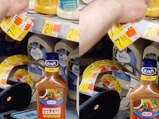 A Walmart employee was caught on camera increasing price tag by 350 per cent