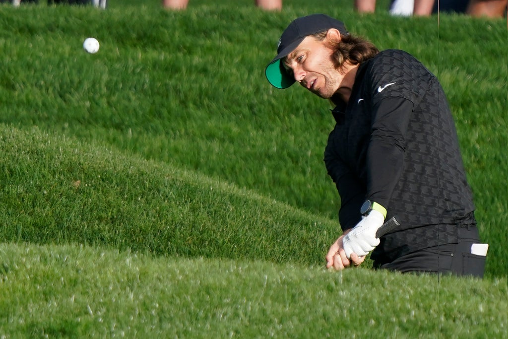Tommy Fleetwood shrugs off weather delay to set Players Championship lead