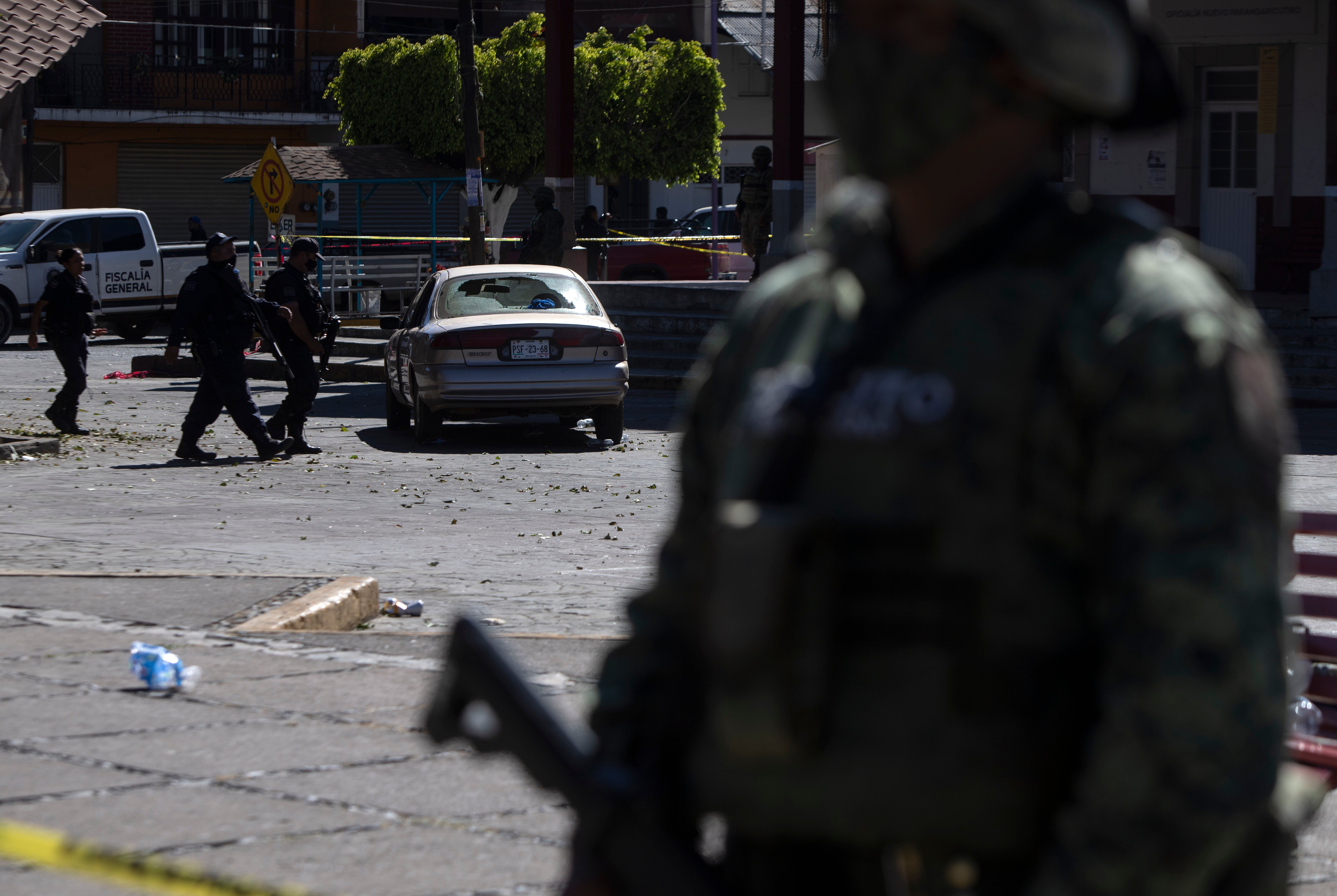 Authorities in the avocado-growing zone of western Mexico said five suspected drug cartel gunmen have been killed in a massive firefight between gangs