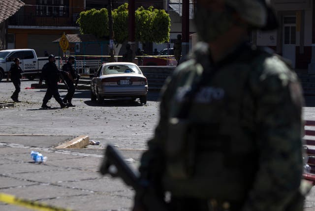 <p>Authorities in the avocado-growing zone of western Mexico said five suspected drug cartel gunmen have been killed in a massive firefight between gangs</p>