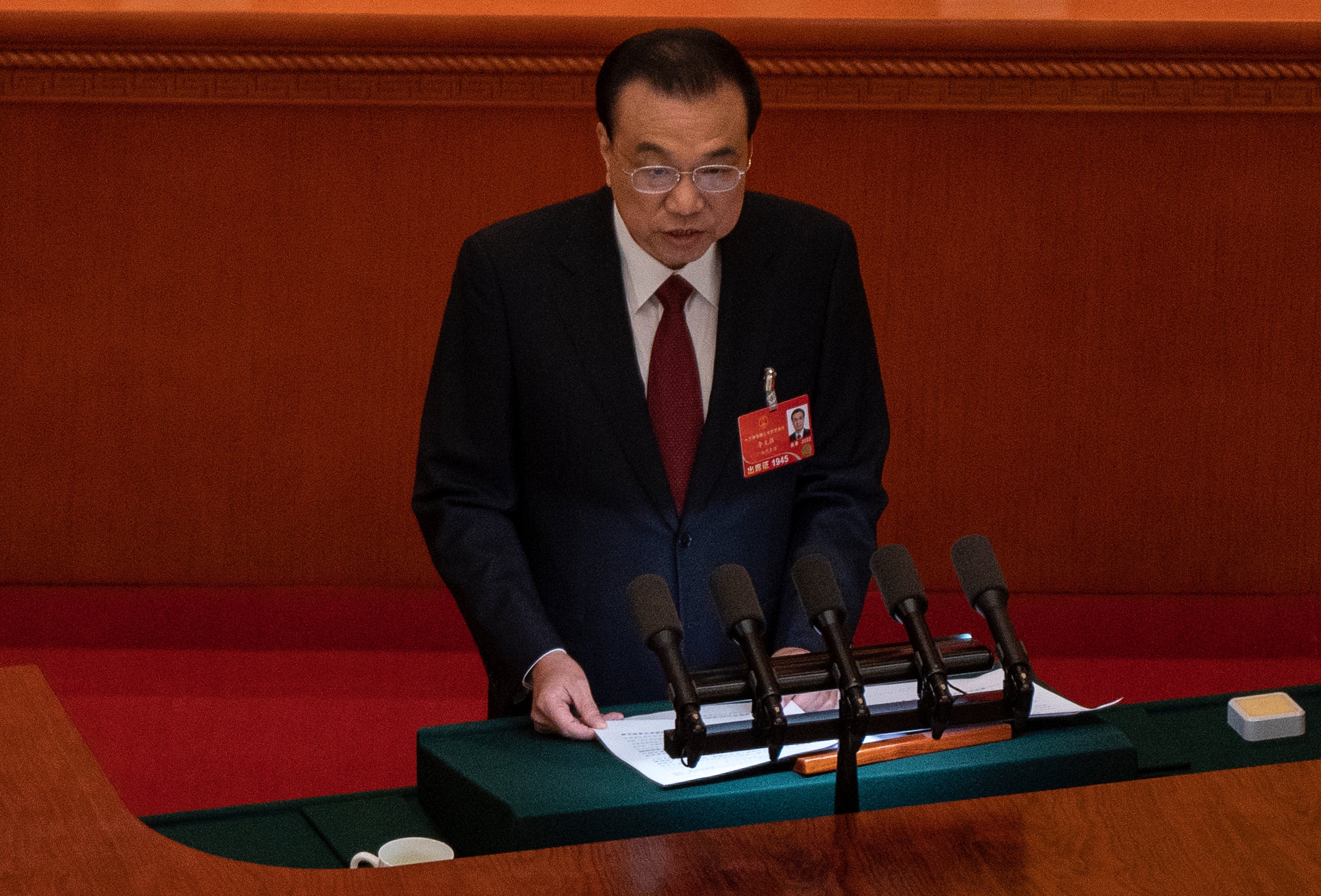 Chinese Premier Li Keqiang speaks from the podium at the opening session of the National Peoples Congress at the Great Hall of the People on 5 March 2022 in Beijing, China
