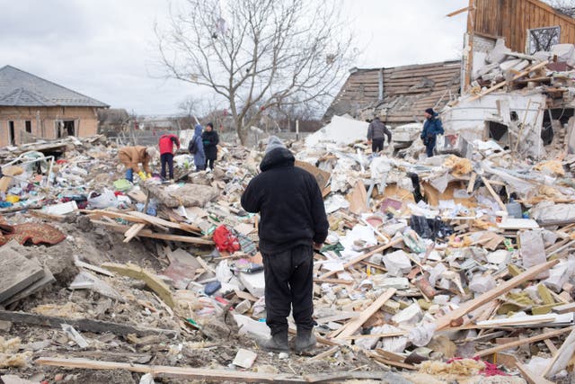<p>Ihor Mazhayev, 54, photographed by his destroyed house, lost his wife, 12 years old daughter and got a concussion as a result of a shelling. Regional police said six people died, including a child, and four were wounded in a Russian air strike on this village southwest of Kyiv</p>