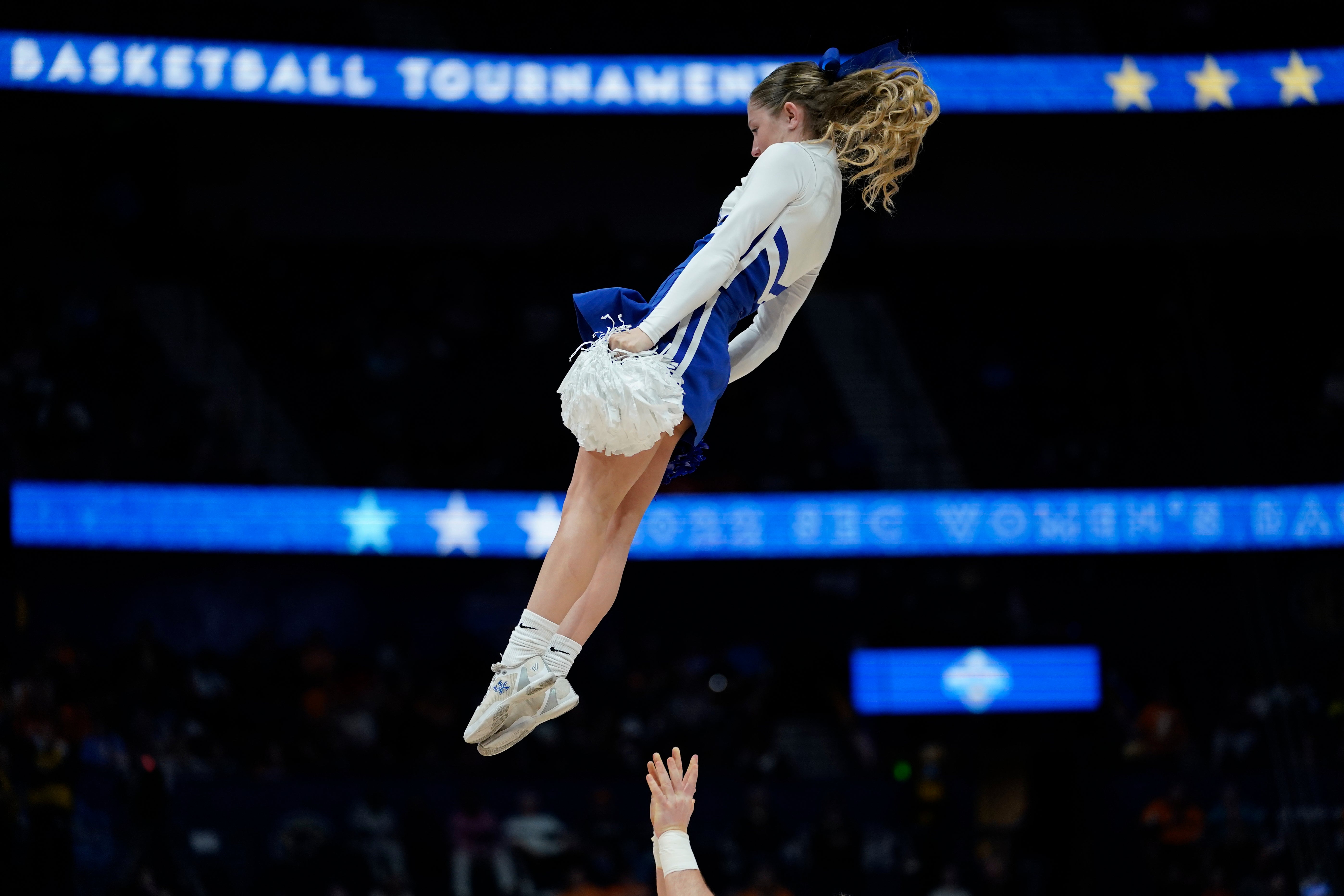 A ‘flyer’ Kentucky cheerleader at a college football game