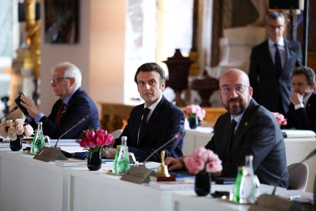 <p>French president Emmanuel Macron and other EU leaders attend a summit at the Palace of Versailles, near Paris on 11 March 2022</p>