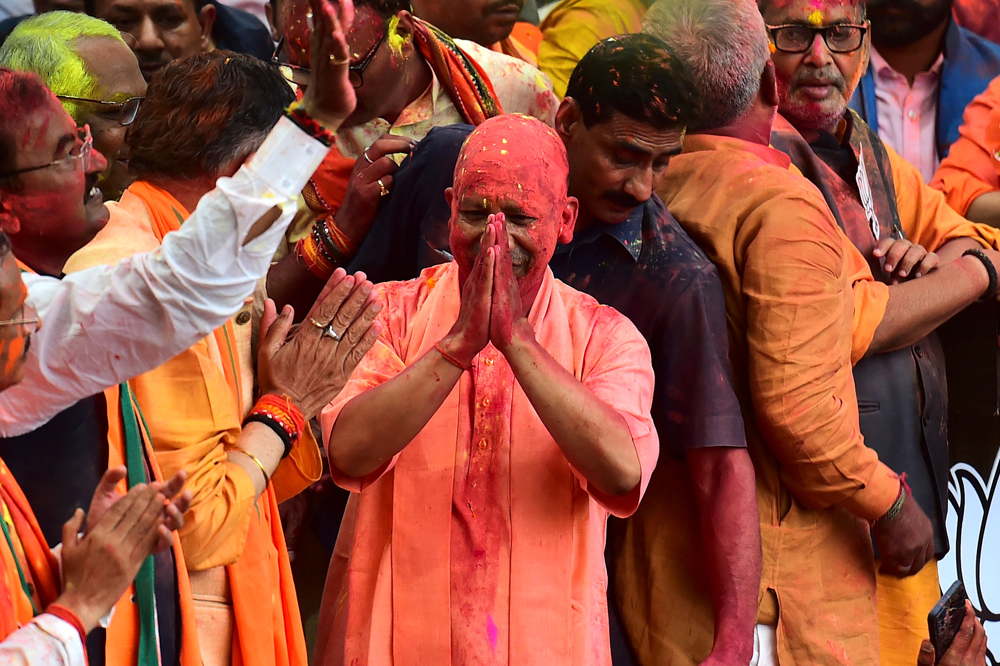 Chief Minister of India’s Uttar Pradesh state Yogi Adityanath with his supporters after Bharatiya Janata Party’s (BJP) win in the state assembly elections
