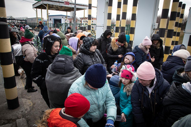 At the Korczowa-Krakovets border crossing between Poland and Ukraine there are endless lines of families