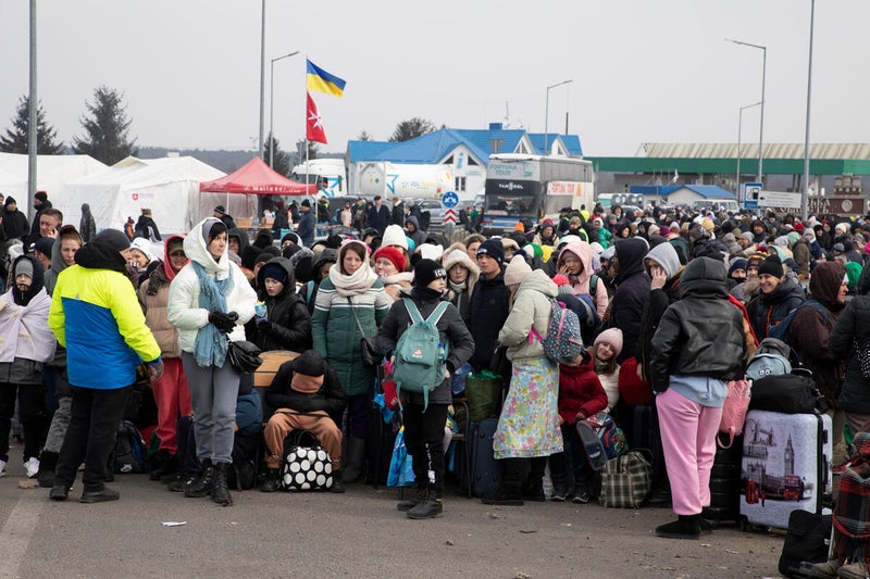 Thousands of Ukrainians seek safety in neighbouring Poland