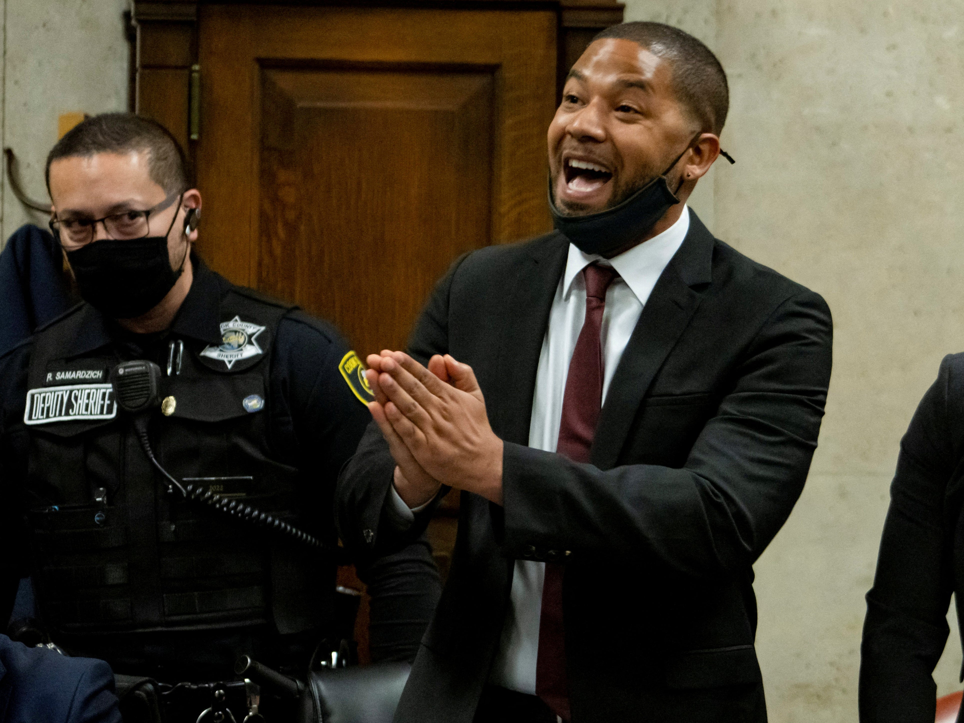 Actor Jussie Smollett speaks to Judge James Linn after his sentence is read at the Leighton Criminal Court Building, in Chicago, Illinois