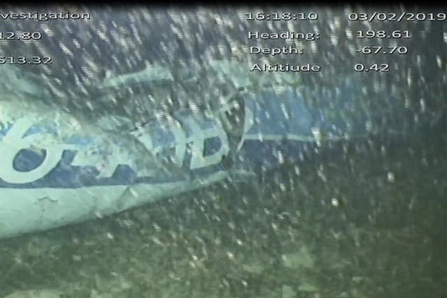 The rear left side of the fuselage, including part of the aircraft registration, in the wreckage of the plane which flew Emiliano Sala (Air Accidents Investigation Branch/PA)