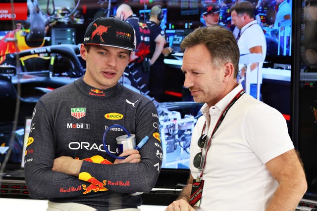 <p>Max Verstappen and Red Bull Racing Team Principal Christian Horner in the garage during Day Two of testing</p>