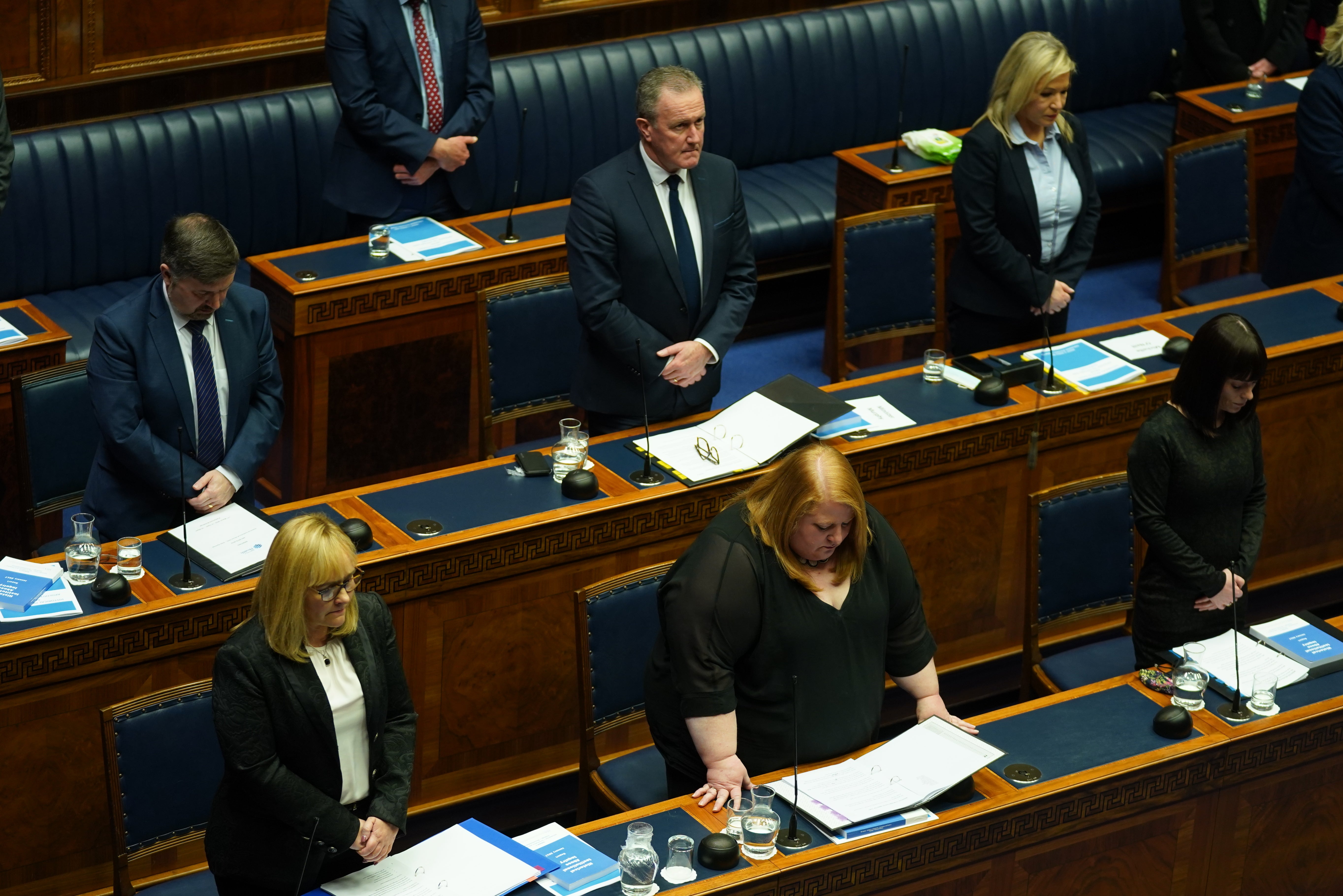 Ministers take part in minute’s silence ahead in the Northern Ireland Assembly chamber at Stormont before the delivery of the long-awaited public apology to the victims of historical institutional abuse. (Brian Lawless/PA)
