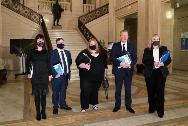 Ministers Nichola Mallon, Robin Swann, Naomi Long, Conor Murphy and Michelle McIlveen as they head to the Northern Ireland Assembly chamber at Stormont before the delivery of the long-awaited public apology to the victims of historical institutional abuse. The public apology was recommended in the final report of the Historical Institutional Abuse Inquiry (HIAI), published more than five years ago (Brian Lawless/PA)
