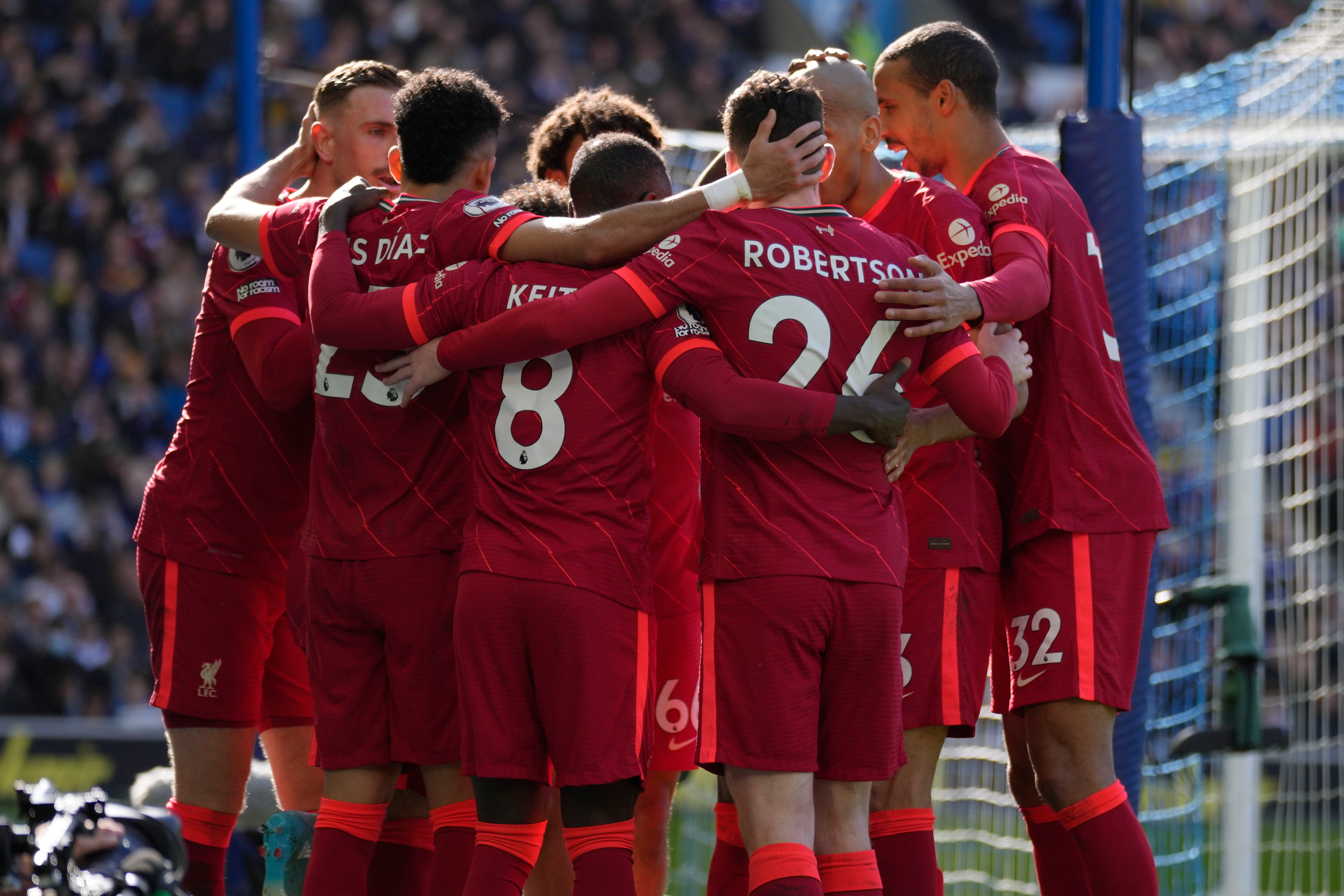 Liverpool players celebrate after Mohamed Salah scores