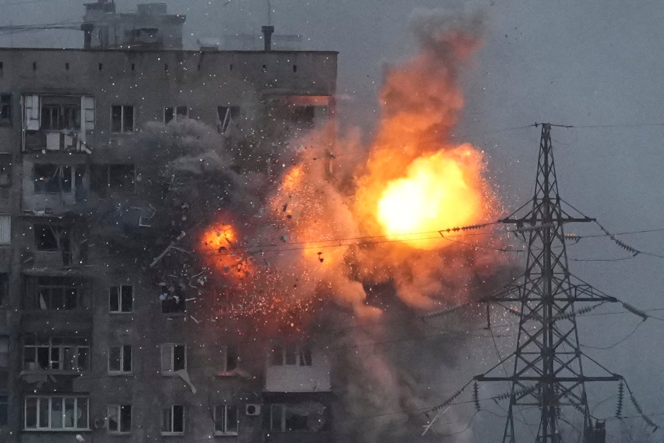 Russian army tank fires at an apartment block in Mariupol, Ukraine