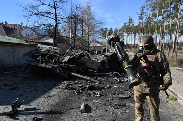 <p>A Ukrainian soldier holds a next generation light anti-tank weapon (N-LAW) that was used to destroy a Russian armoured personal carrier in Irpin, north of Kyiv</p>