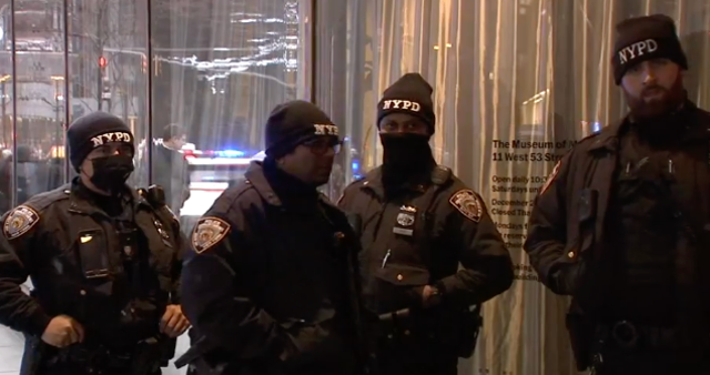 <p>New York Police Department stand in front of the Museum of Modern Art on 12 March, 2022, after two people were reportedly stabbed inside. </p>