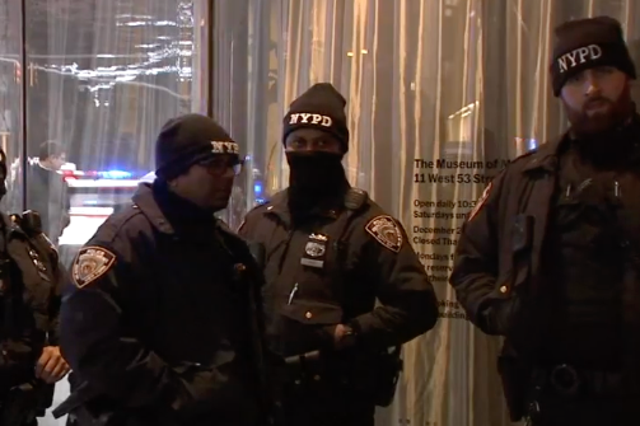 <p>New York Police Department stand in front of the Museum of Modern Art on 12 March, 2022, after two people were reportedly stabbed inside. </p>