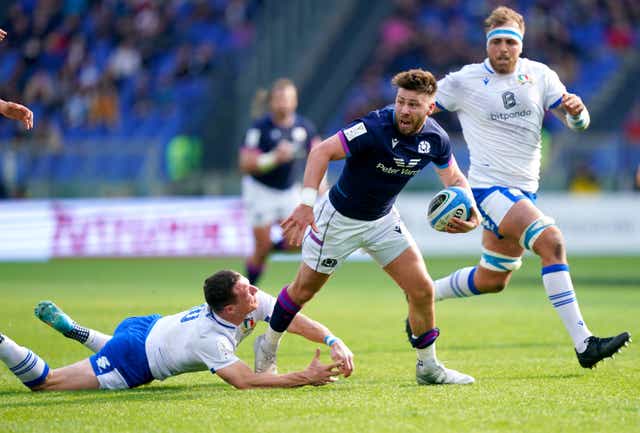 Scotland’s Ali Price is tackled by Italy’s Paolo Garbisi (Mike Egerton/PA)