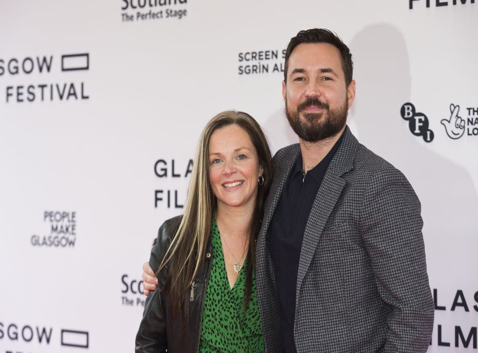 Annemarie Fulton and Martin Compston arriving for the 20th anniversary screening for the film Sweet Sixteen at the Glasgow Film Festival (Eoin Carey/PA)