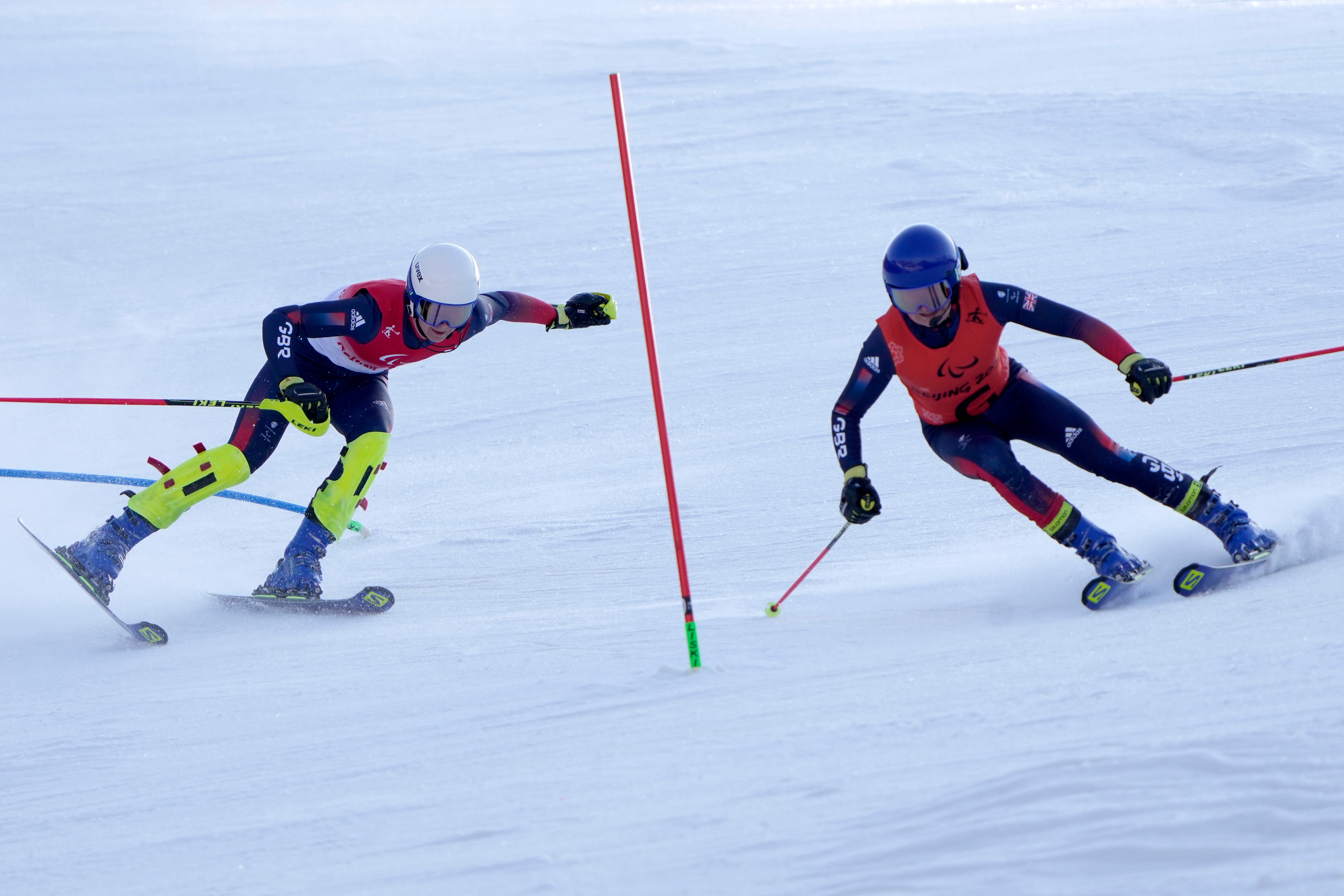 Neil Simpson (left), Great Britain’s only gold medallist at the Paralympics, was again in action in the slalom on the final day of competition in Beijing before carrying the nation’s flag at the closing ceremony (Andy Wong/AP)