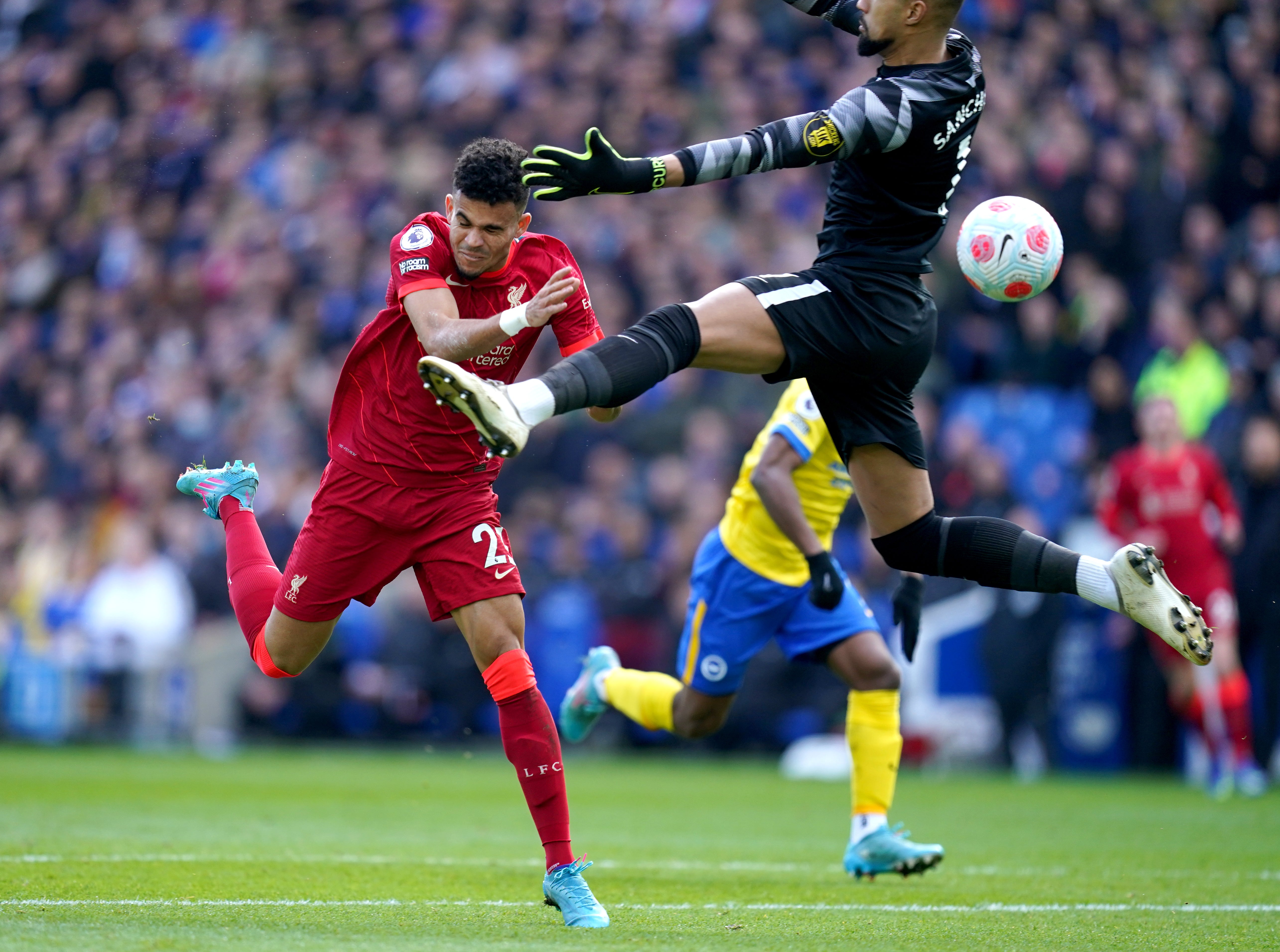 In the title race, Luis Diaz bravely headed Liverpool’s opener in their 2-0 win over Brighton, taking a blow in a controversial challenge from Robert Sanchez in the process (Nick Potts/PA)