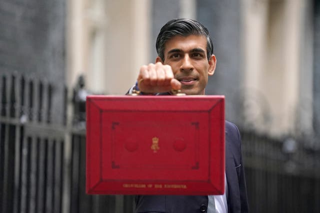 <p>Chancellor of the Exchequer Rishi Sunak holding his ministerial ‘Red Box’ (Victoria Jones/PA)</p>