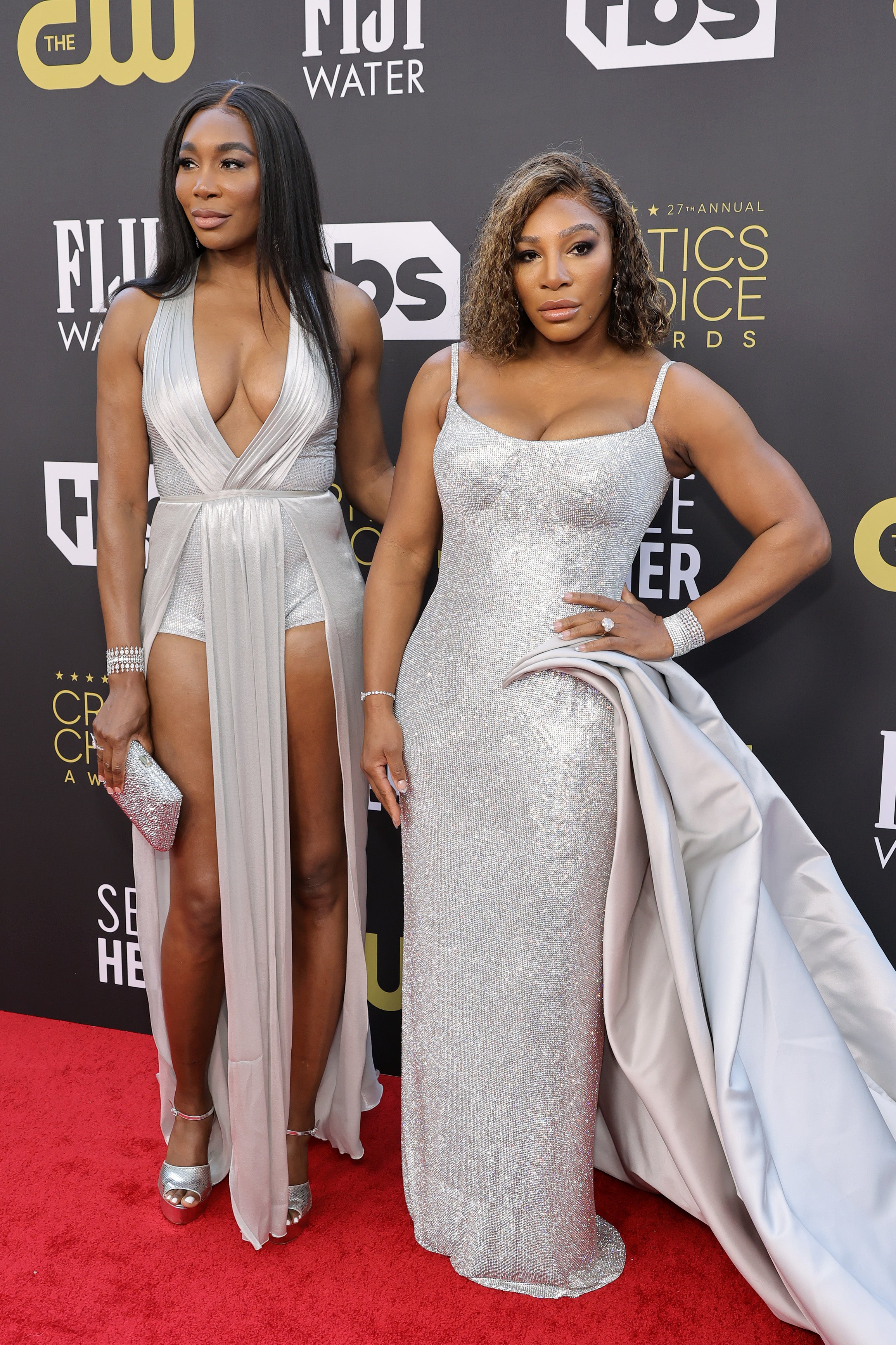 The sisters wore silver Versace gowns