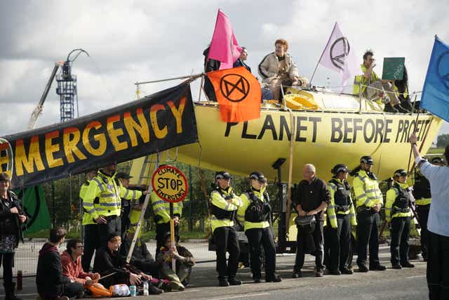 <p>Fracking activists block the entrance to the Cuadrilla fracking site near Blackpool in 2019.  </p>