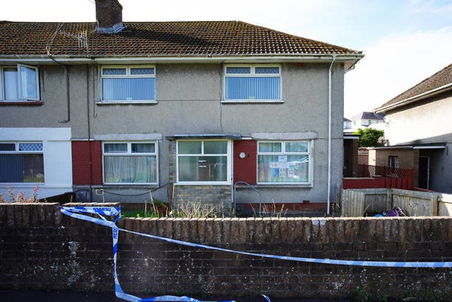 Police tape at a ground floor flat in the Sarn area of Bridgend, south Wales, where five-year-old Logan Mwangi lived with his family (ben Birchall/PA)