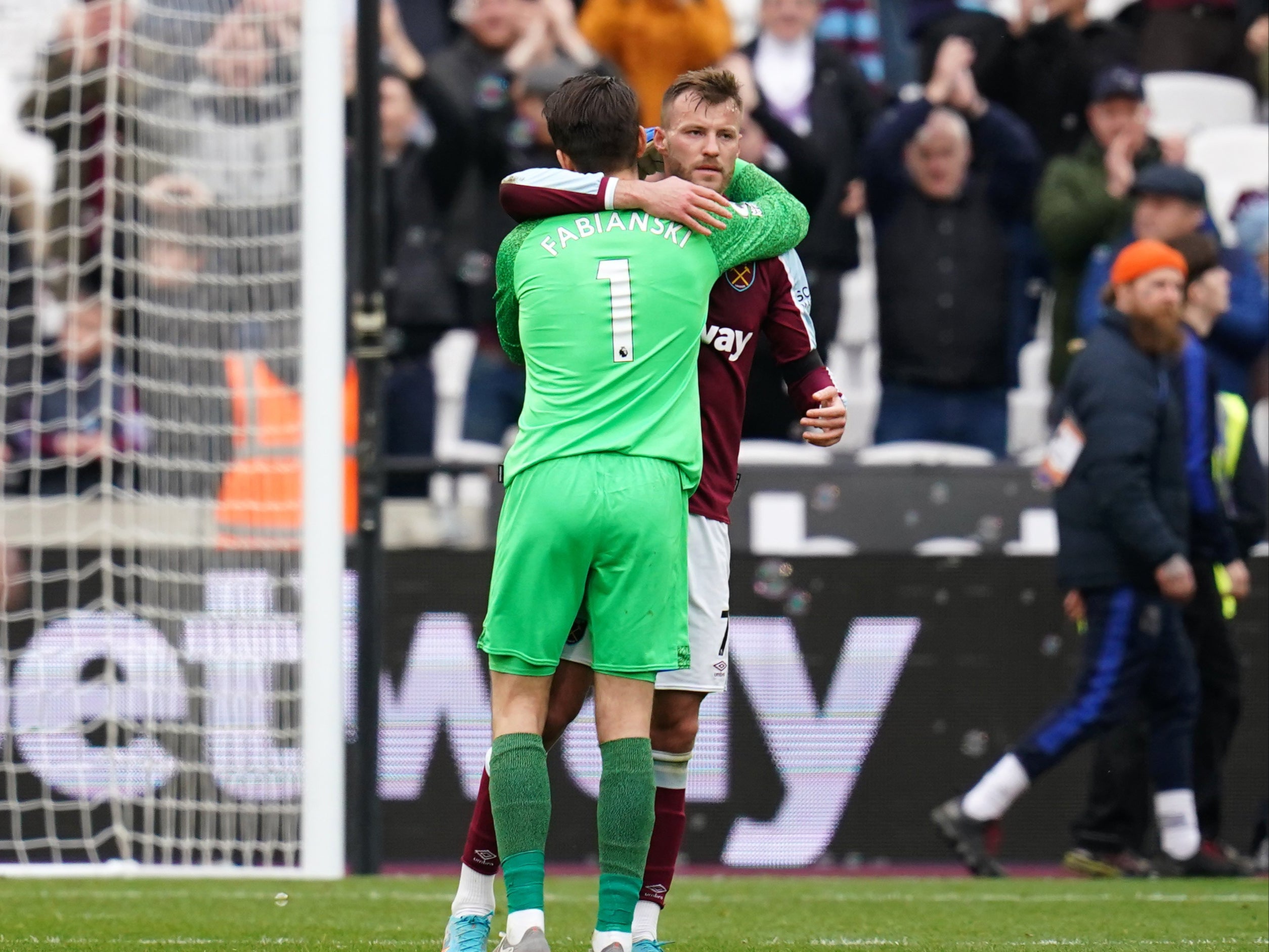 West Ham’s Andriy Yarmolenko is embraced by goalkeeper Lukasz Fabianski (John Walton/PA)