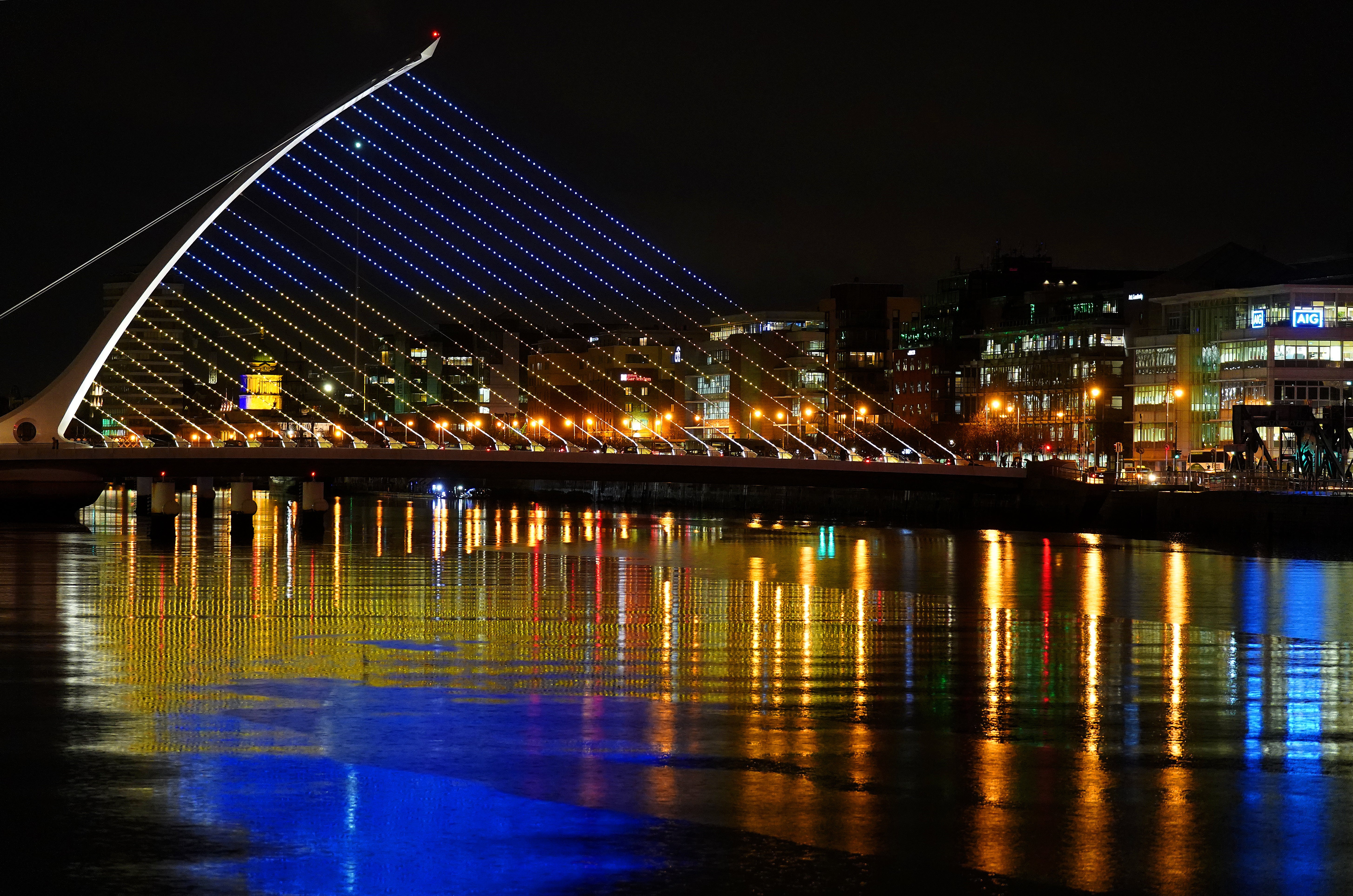 The Samuel Beckett Bridge in Dublin’s city centre displays the colours of the Ukrainian flag as a show of support. The country is sending body armour and meals to Ukrainian troops (Brian Lawless/PA)