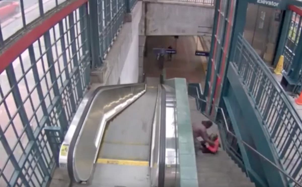 Nurse thrown down stairs in brutal rail station attack caught on video